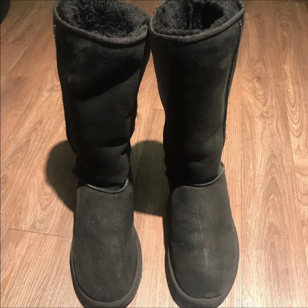 Tall black boots